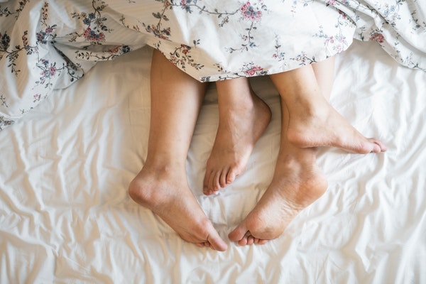 A couple in bed